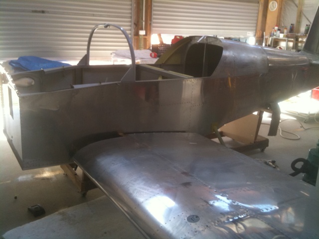 Fuselage is together. Wings were attached inside my shed at home, where it just fitted. This enabled the wings to be fully lined up with the correct measurements, and finally the rear spar drilled and ready to bolt. The final assembly will take place at the hangar.