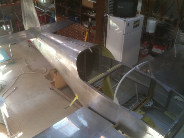 With the tail plane on showing fuselage from above. The front deck is not installed and this gives plenty of room and access to install the behind panel items. Once that goes on then I'll have to crawl under the dash to make any installation.