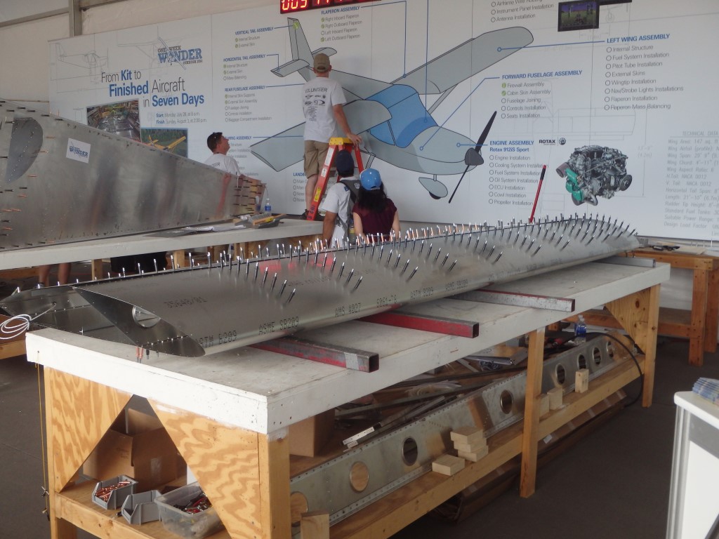 The flaperons are coming together. Clecoes are in and its ready for riveting. Everyone who assists is classed as a 